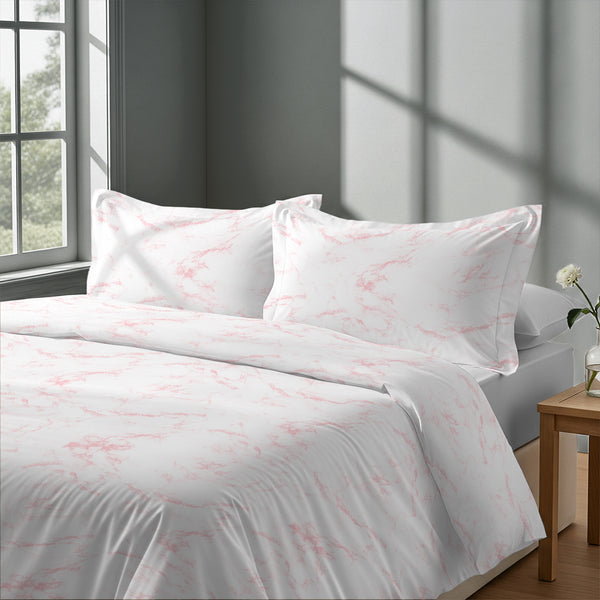 Calm luxurious bedroom bed with Carrara Marble Pink Pizuna Linens cotton duvet cover double size