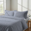 Calm luxurious bedroom bed with Cascade Stripe Blue Pizuna Linens cotton duvet cover double size