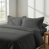 Calm luxurious bedroom bed with Dark grey Pizuna Linens cotton duvet cover emperor size