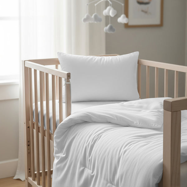 Cot bed with white baby cotton duvet cover 100x135 cm