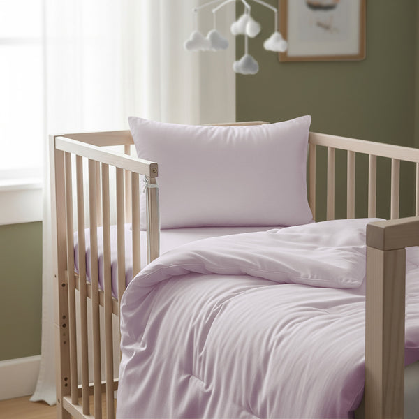 Cot bed with light lilac baby cotton duvet cover 100x135 cm