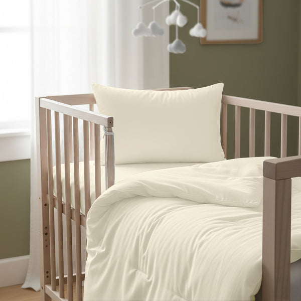 Cot bed with ivory baby cotton duvet cover 100x135 cm