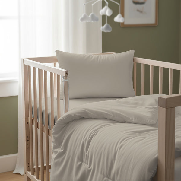 Cot bed with simply taupe baby cotton duvet cover 100x135 cm