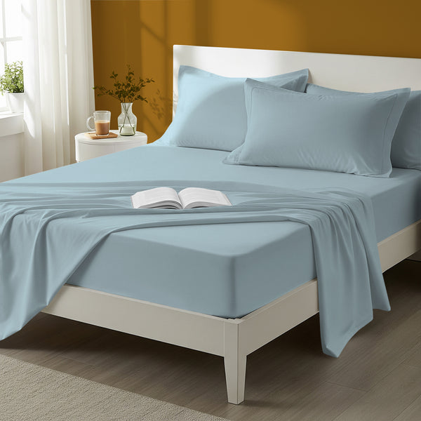 Bed styled in a bedroom with percale cotton Baby Blue 4 piece double size sheet set