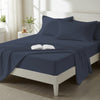 Bed styled in a bedroom with percale cotton Dark Blue 4 piece double size sheet set