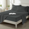 Bed styled in a bedroom with percale cotton Dark Grey 4 piece king size sheet set