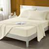 Bed styled in a bedroom with percale cotton Ivory 4 piece double size sheet set