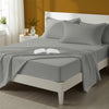 Bed styled in a bedroom with percale cotton Silver 4 piece king size sheet set