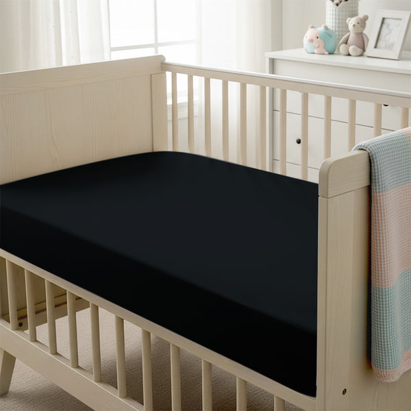Baby cot setup with 40x90cm Black cot fitted sheet moisture wicking and gentle on skin