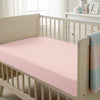 Baby cot setup with 40x90cm Light Pink cot fitted sheet moisture wicking and gentle on skin