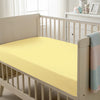 Baby cot setup with 40x90cm Mellow Yellow cot fitted sheet moisture wicking and gentle on skin