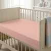 Baby cot setup with 40x90cm Misty Rose cot fitted sheet moisture wicking and gentle on skin