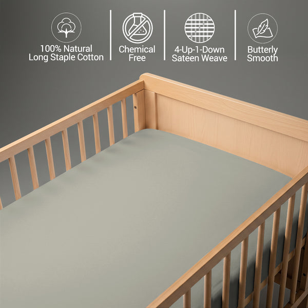 Peaceful nursery scene showing a crib with a silver cotton crib flat sheet 120×150 cm