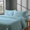 Bedroom with 3 piece 600 thread count baby blue emperor duvet cover and pillowcases on the bed