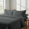 Bed in a bedroom dressed with percale cotton duvet cover Dark Grey king 3 piece