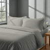 Bedroom with 3 piece 600 thread count silver emperor duvet cover and pillowcases on the bed