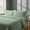 Bed in bedroom dressed with luxurious Sea Foam double 800 thread count duvet cover 3 piece and pillowcases