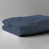 Folded Pizuna luxurious cotton Super King size fitted sheet dark blue 1000 thread count long staple cotton