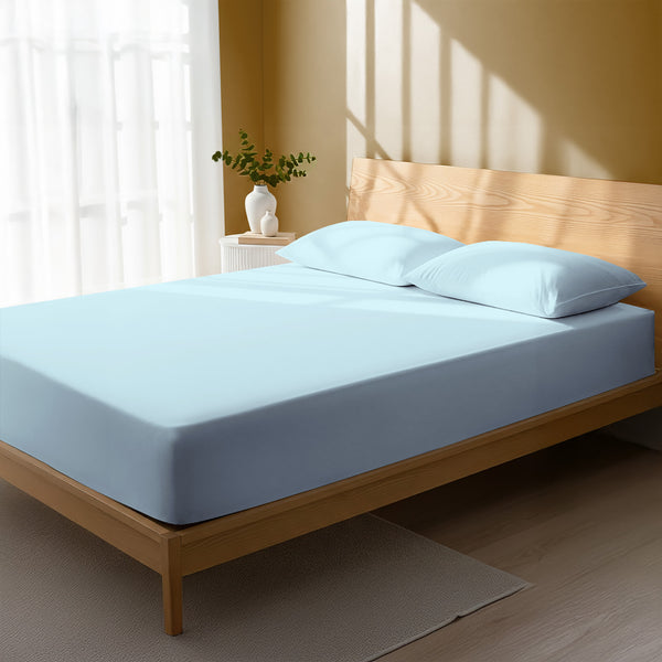 Bedroom bed dressed in Baby Blue double 800 thread count luxurious thick fitted sheet