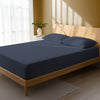 Bedroom bed dressed in Dark Blue double 800 thread count luxurious thick fitted sheet