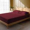 Bedroom bed dressed in Rio Red double 800 thread count luxurious thick fitted sheet