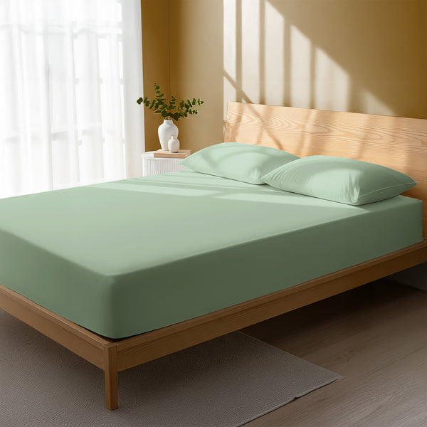 Bedroom bed dressed in Sea Foam double 800 thread count luxurious thick fitted sheet