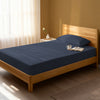 Bedroom bed dressed in Dark Blue single 800 thread count luxurious thick fitted sheet