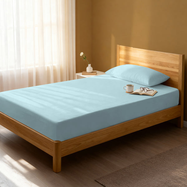 Bed in bedroom dressed with luxurious 1000 thread count baby blue Single