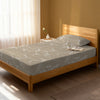 Bed in a bedroom dressed with 400 thread count Marble Taupe EU Single cotton fitted sheet