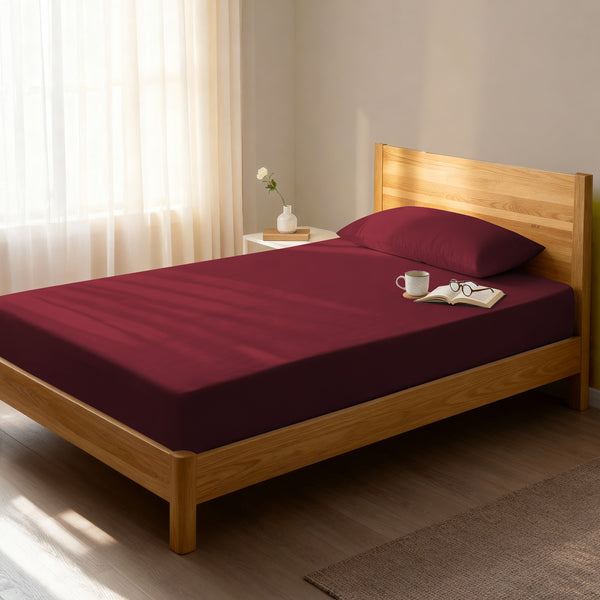 Bedroom bed dressed in Rio Red single 800 thread count luxurious thick fitted sheet