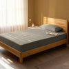 Bed in bedroom dressed with luxurious 1000 thread count simply taupe eu single