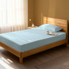 Bedroom with baby blue single percale cotton fitted sheet lightweight and cool