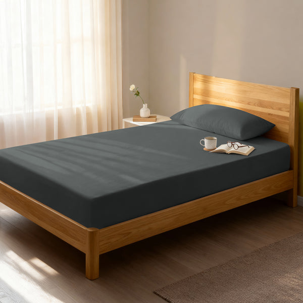 Bedroom with dark grey single percale cotton fitted sheet lightweight and cool