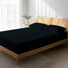 Bedroom with black double size fitted sheet luxurious look