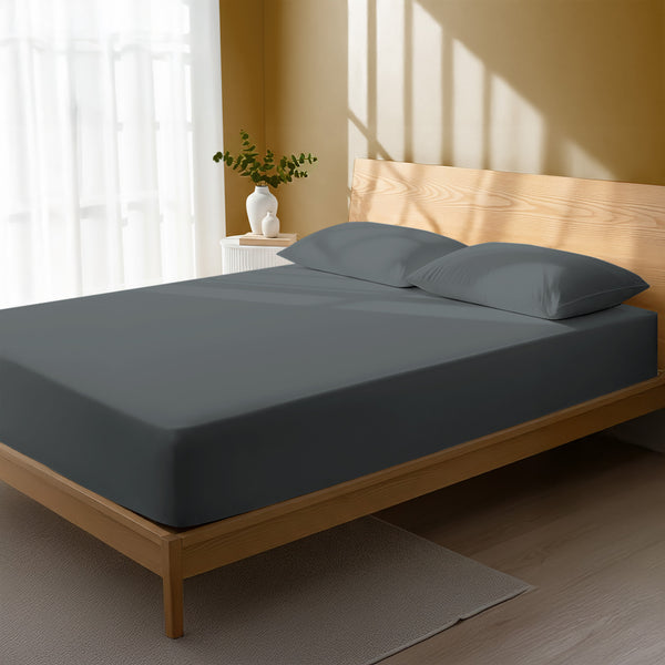 Bedroom bed dressed in Dark Grey double 800 thread count luxurious thick fitted sheet