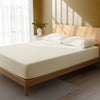 Bedroom with ivory king size fitted sheet luxurious look