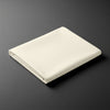 Folded Pizuna Linens ivory double size cotton flat sheet 600 thread count soft and dense structure