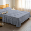 Serene bedroom with premium cotton flat sheet Cascade Stripe Navy super king size 400 thread count
