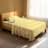 Serene bedroom with premium cotton flat sheet mellow yellow single size 400 thread count