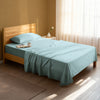 Serene bedroom with premium cotton flat sheet baby blue single size 400 thread count