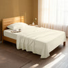 Serene bedroom with premium cotton flat sheet ivory single size 400 thread count
