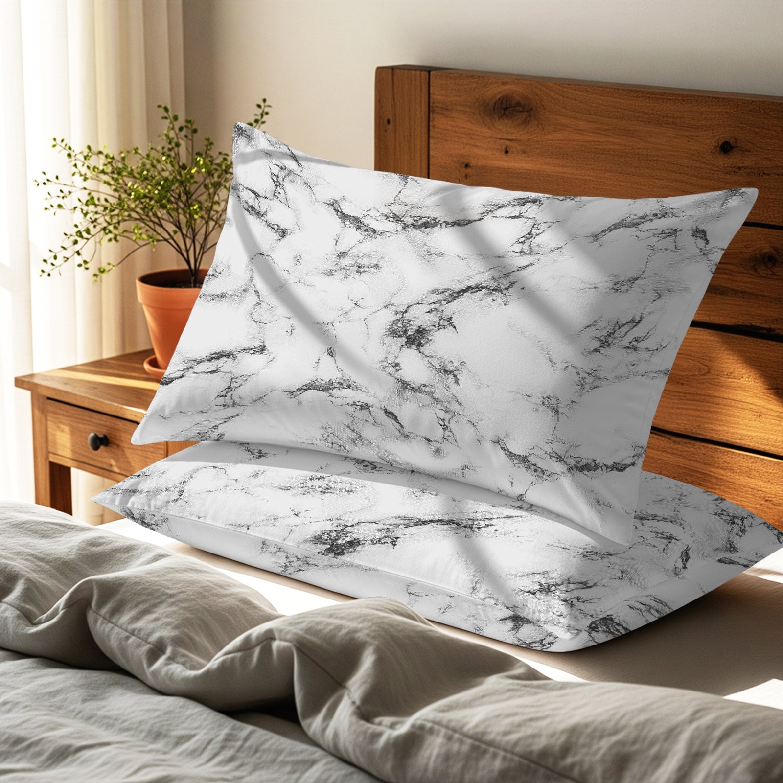 marble white housewife pillowcases premium 400 thread count on pillows on bed in bedroom