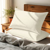 ivory housewife pillowcases premium 400 thread count on pillows on bed in bedroom