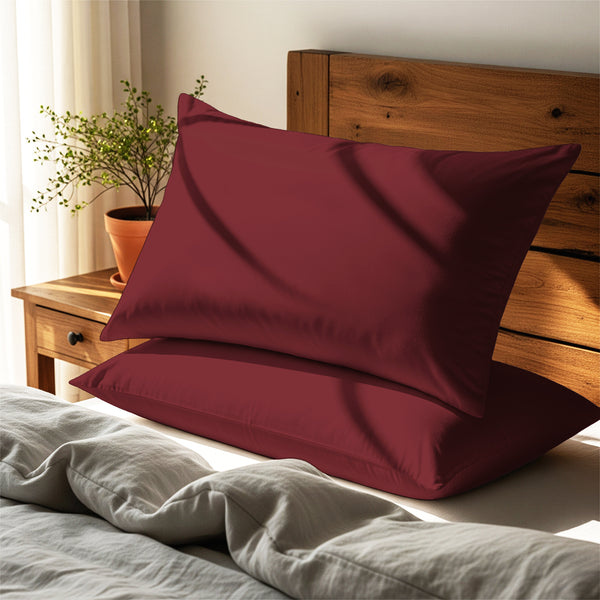 rio red housewife pillowcases premium 400 thread count on pillows on bed in bedroom