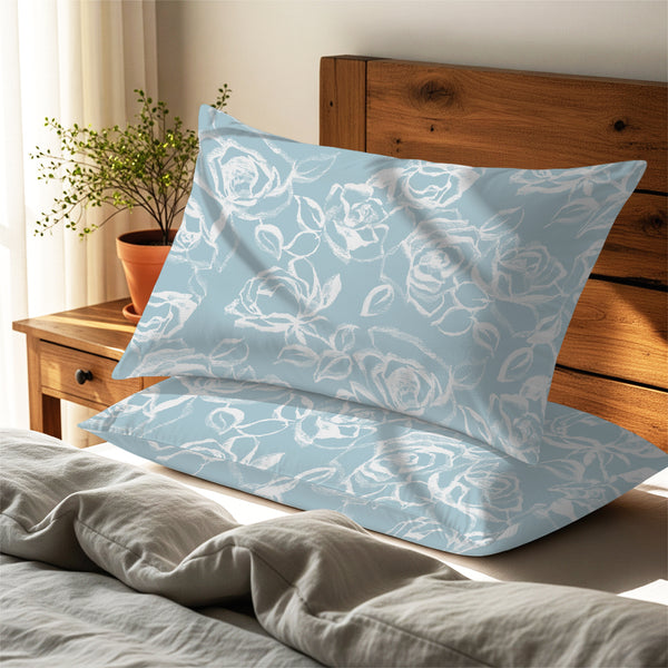 simply floaral blue housewife pillowcases premium 400 thread count on pillows on bed in bedroom