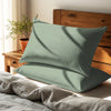 Simply taupe housewife pillowcases cotton percale on pillows on bed in bedroom
