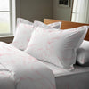 carrara marble pink oxford standard pillowcases premium 400 thread count on pillows on bed in bedroom