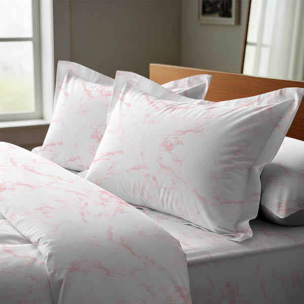carrara marble pink oxford standard pillowcases premium 400 thread count on pillows on bed in bedroom