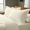ivory oxford standard pillowcases premium 400 thread count on pillows on bed in bedroom