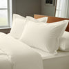 Ivory oxford king pillowcases deluxe 600 thread count on pillows on bed in bedroom